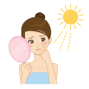 紫外線による日焼けで肌が赤くなっている女性